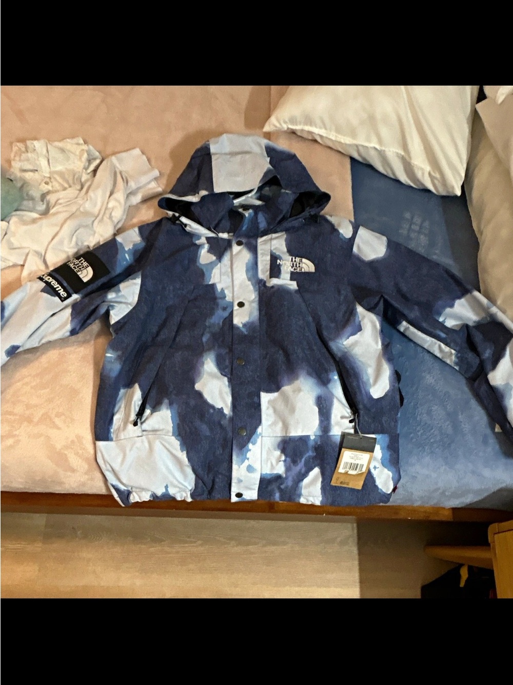 Supreme x The North Face Bleached Denim Print Mountain Jacket